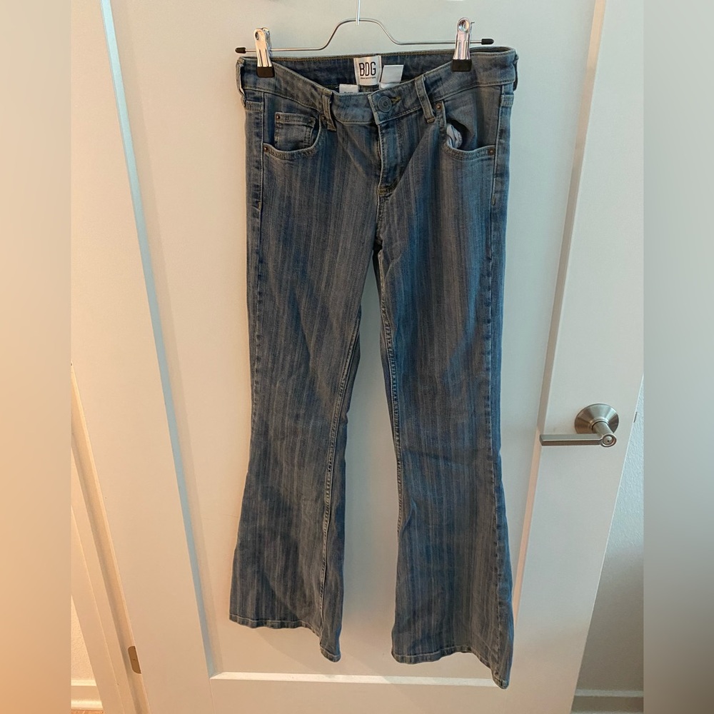 Low rise dark denim. Waist 27. Length 32
